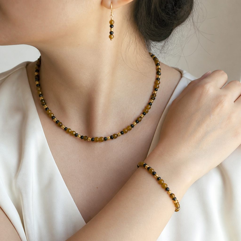 Set collana e bracciale Ocra e rosa, ocra, nero, oro rosa, foto 1 di 5